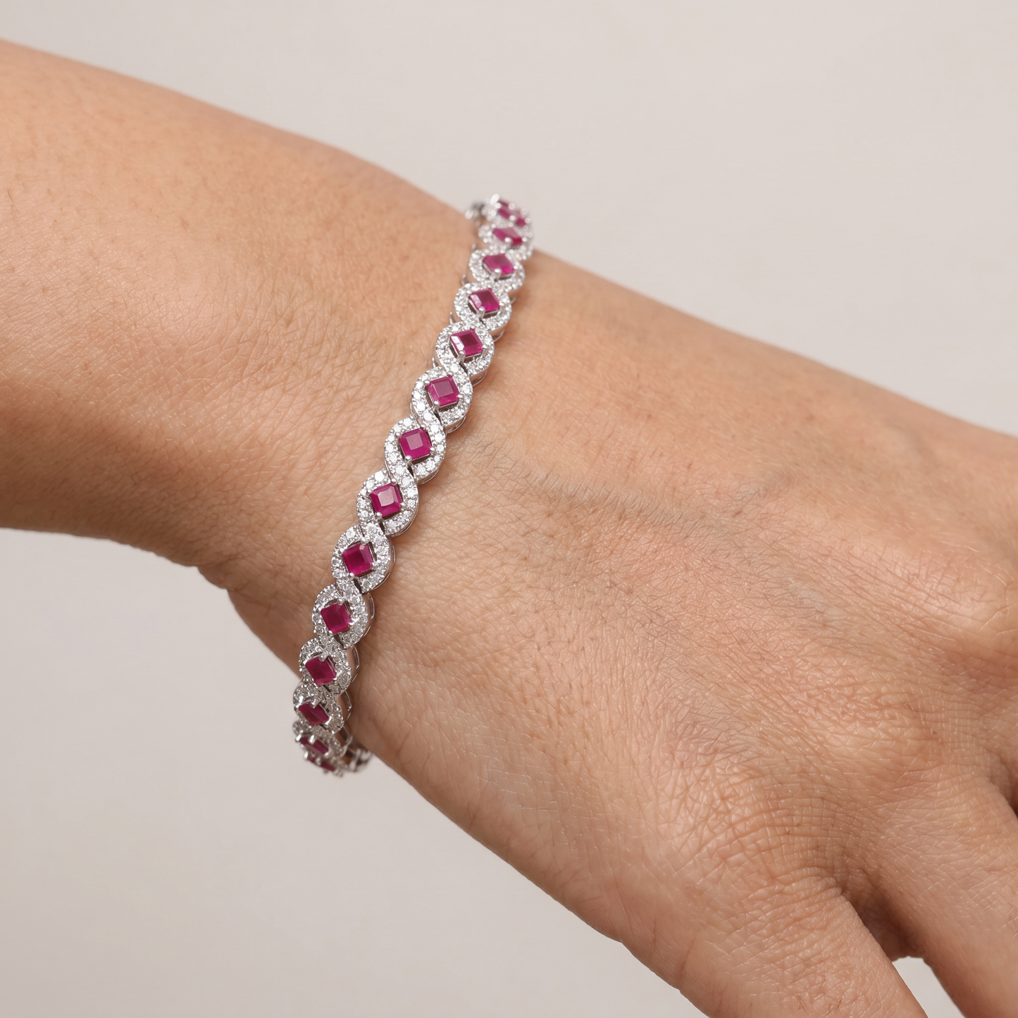 Rhodium Bracelet with Balanced Chevron Arrangement and Floral Details