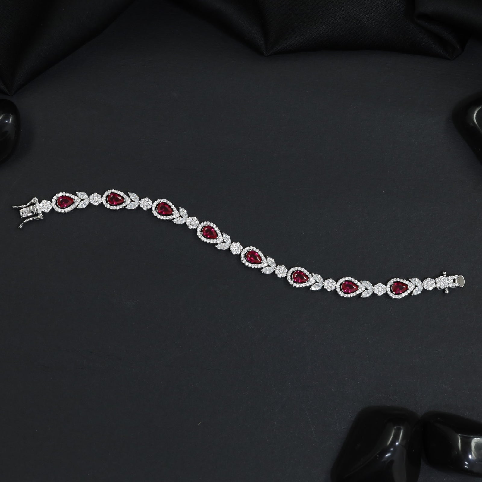 Rhodium Statement Bracelet Featuring Leaf Links and Cluster Elements