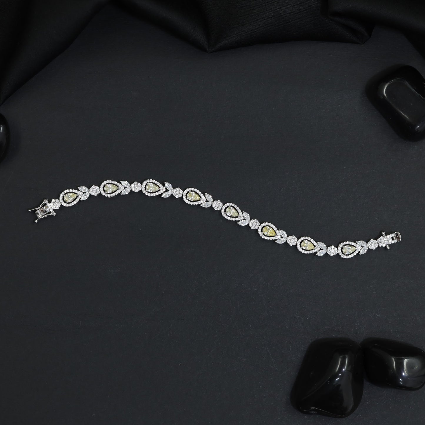 Rhodium Statement Bracelet Featuring Leaf Links and Cluster Elements