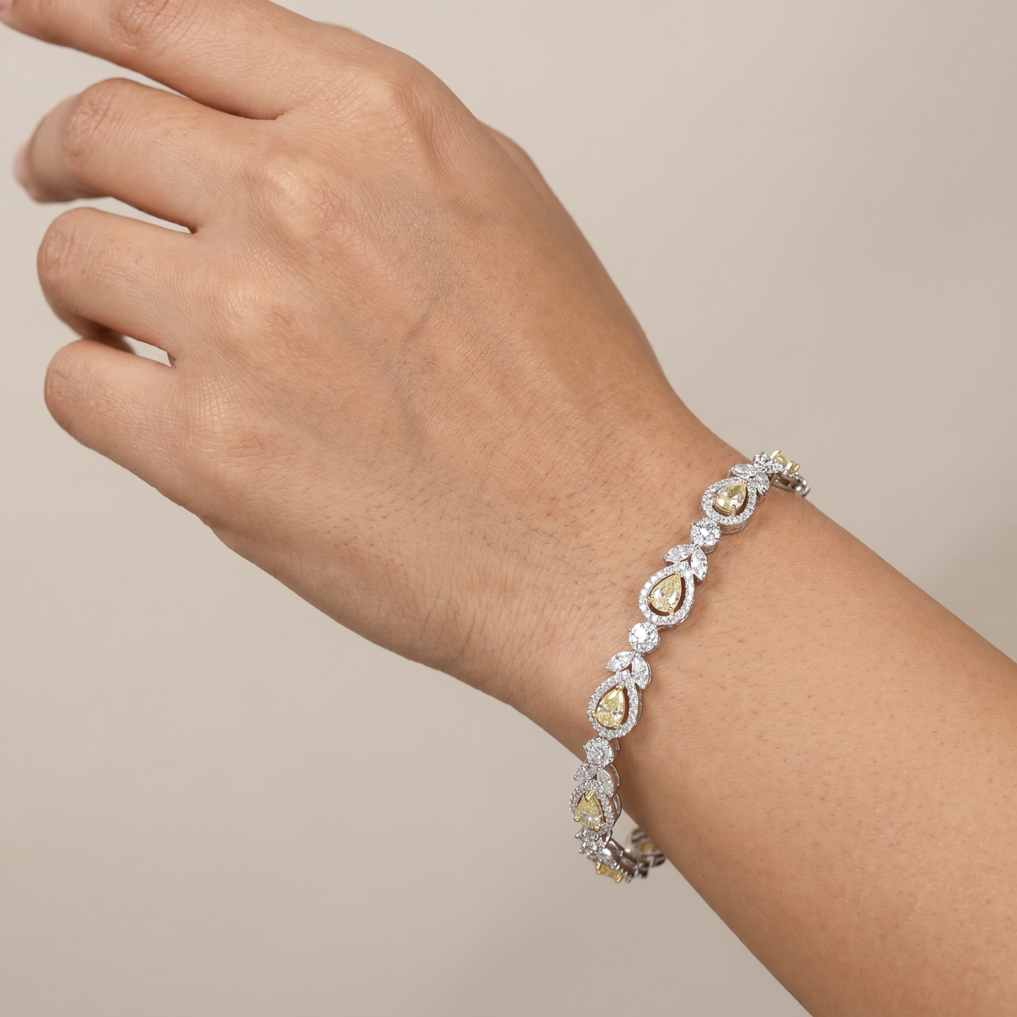 Rhodium Statement Bracelet Featuring Leaf Links and Cluster Elements