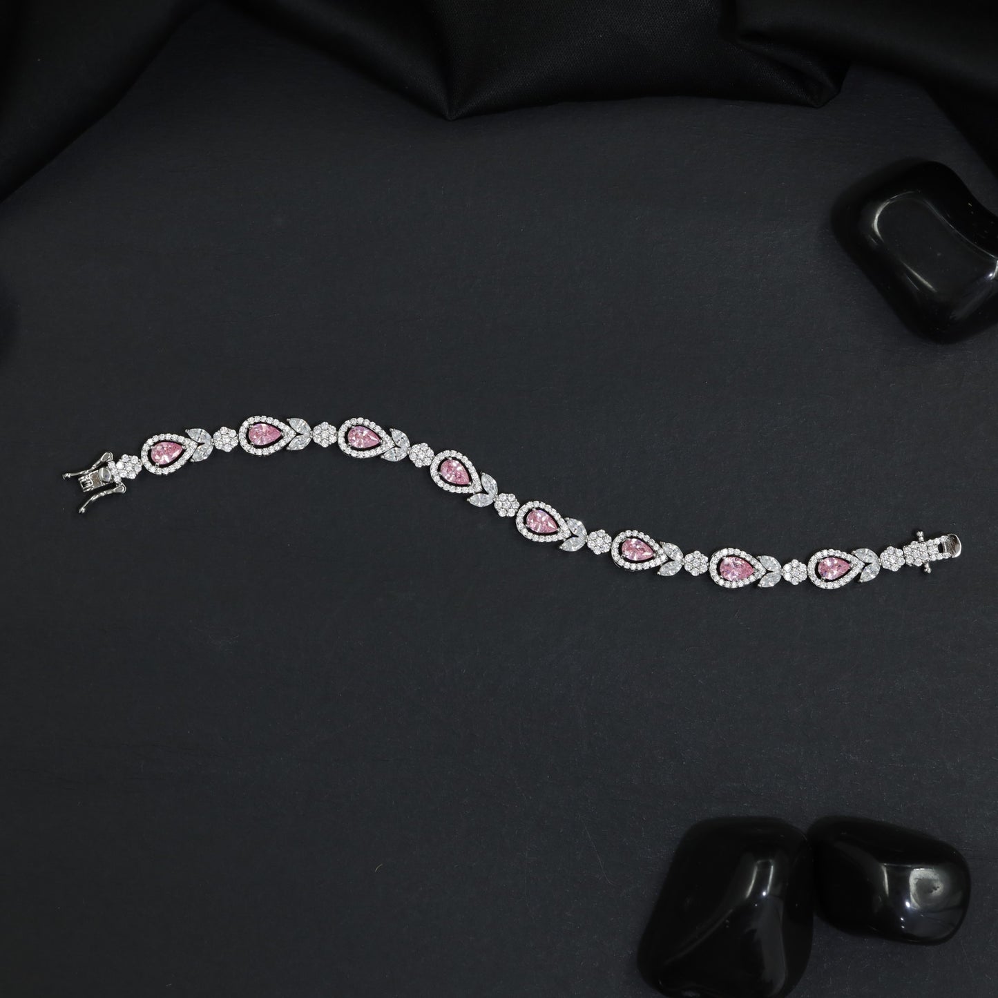 Rhodium Statement Bracelet Featuring Leaf Links and Cluster Elements