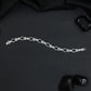 Rhodium Statement Bracelet Featuring Leaf Links and Cluster Elements
