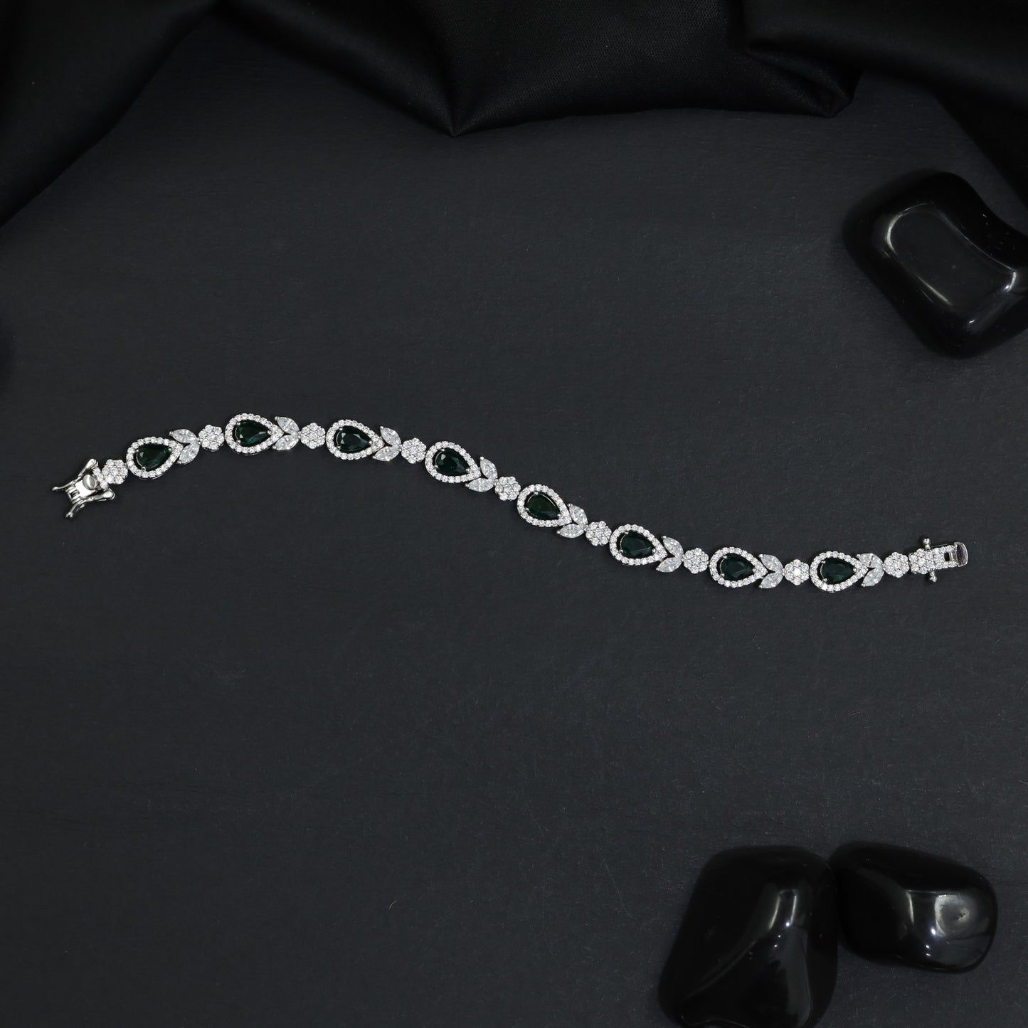 Rhodium Statement Bracelet Featuring Leaf Links and Cluster Elements
