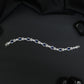 Rhodium Statement Bracelet Featuring Leaf Links and Cluster Elements