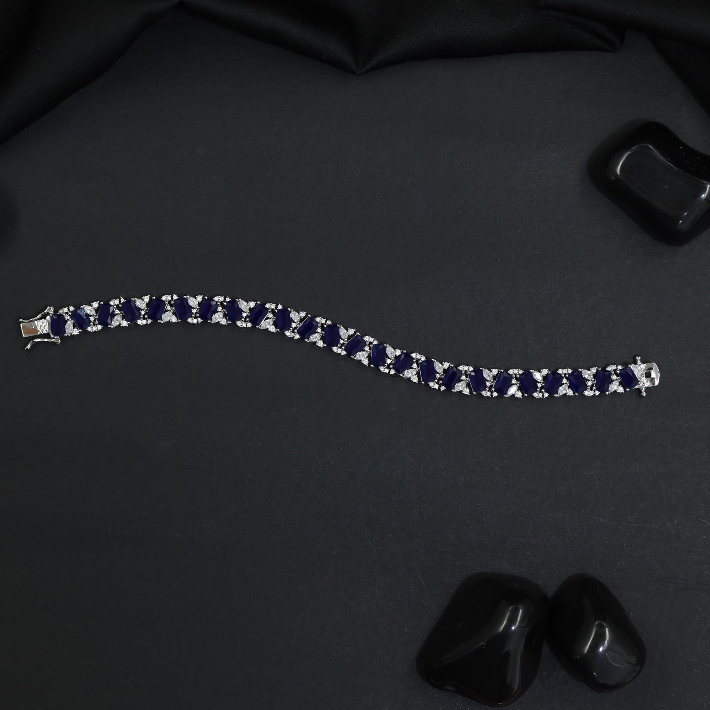 Rhodium Bracelet with Structured Chevron Links and Decorative Connectors