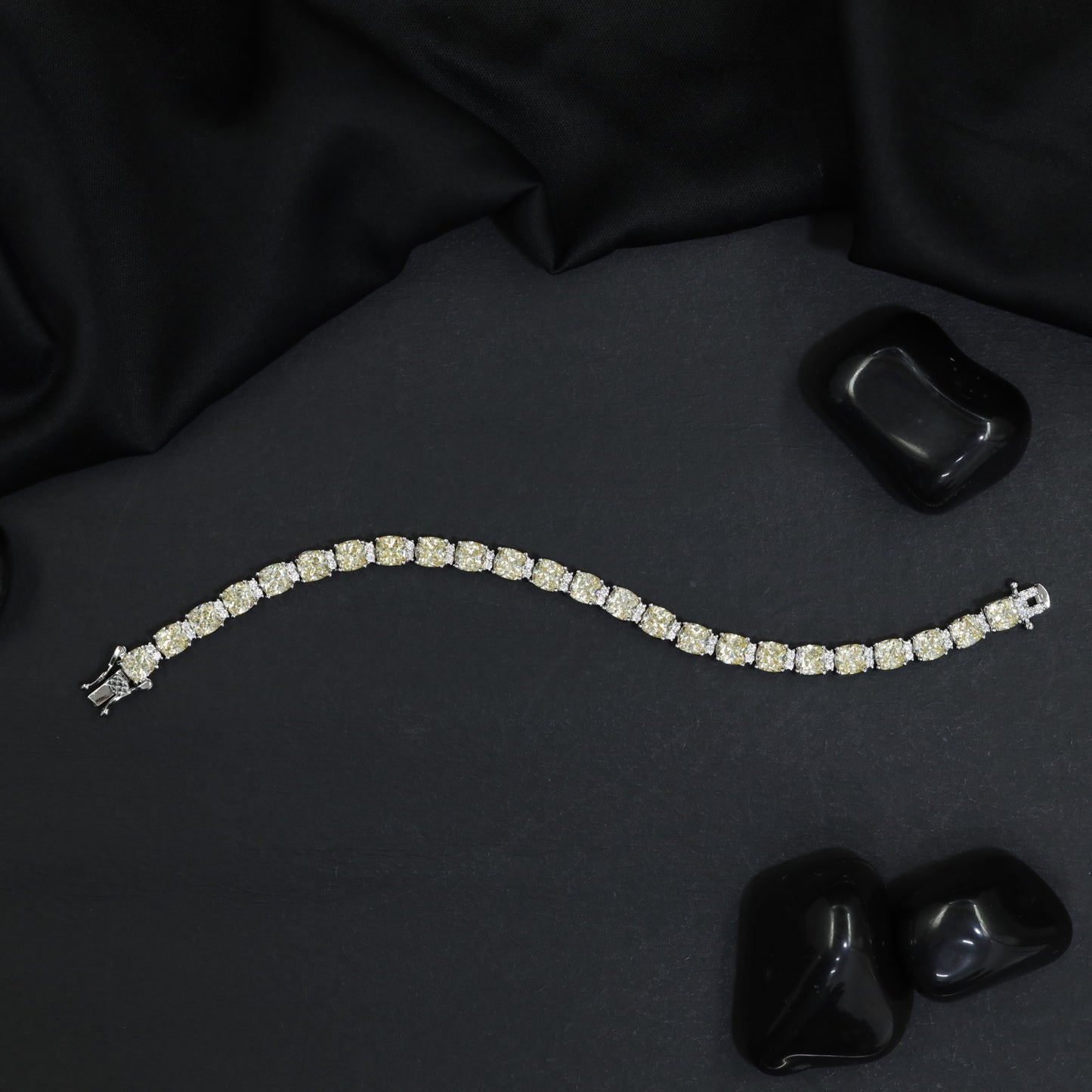 Rhodium Link Bracelet Showcasing Cushion Elements and Cluster Accents