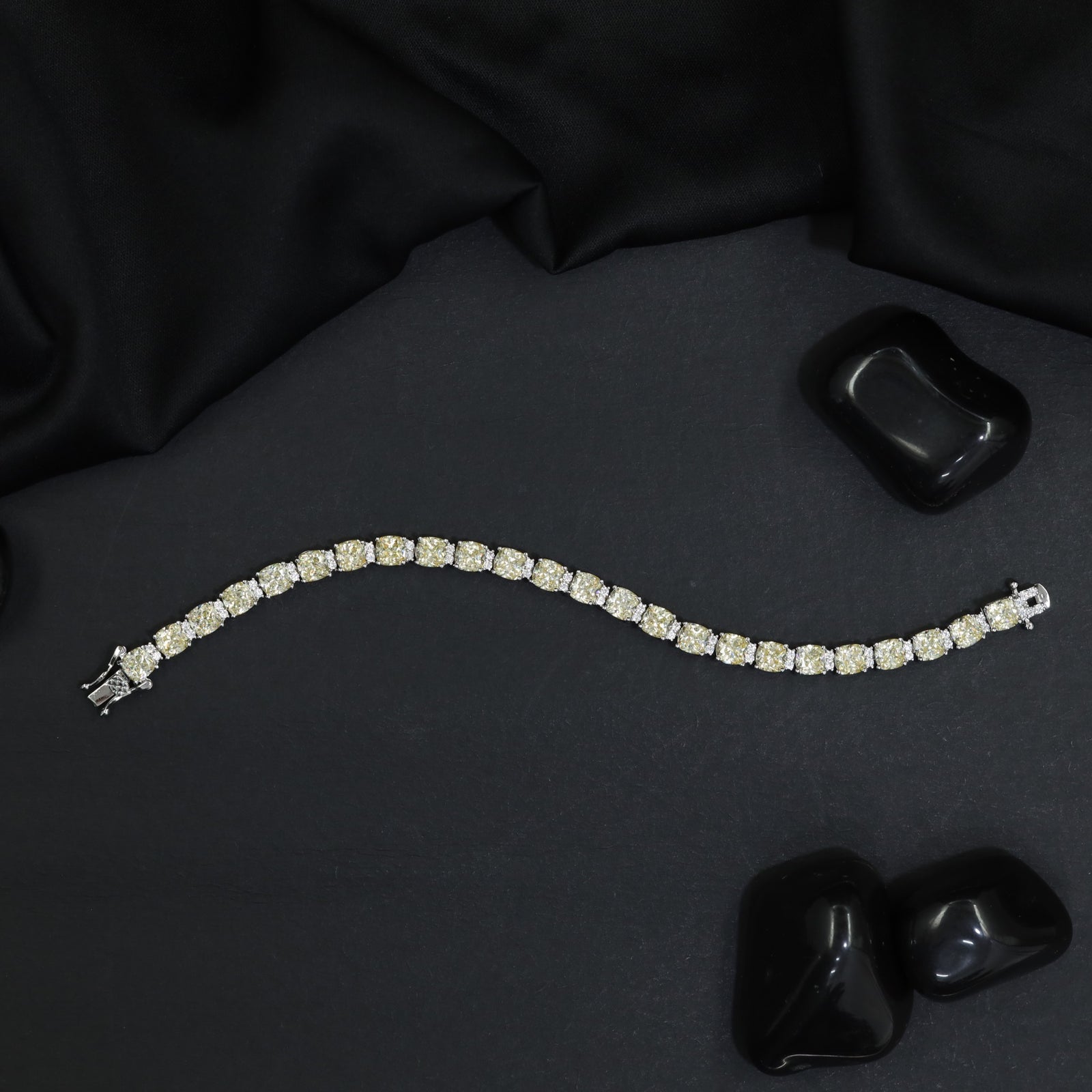 Rhodium Link Bracelet Showcasing Cushion Elements and Cluster Accents