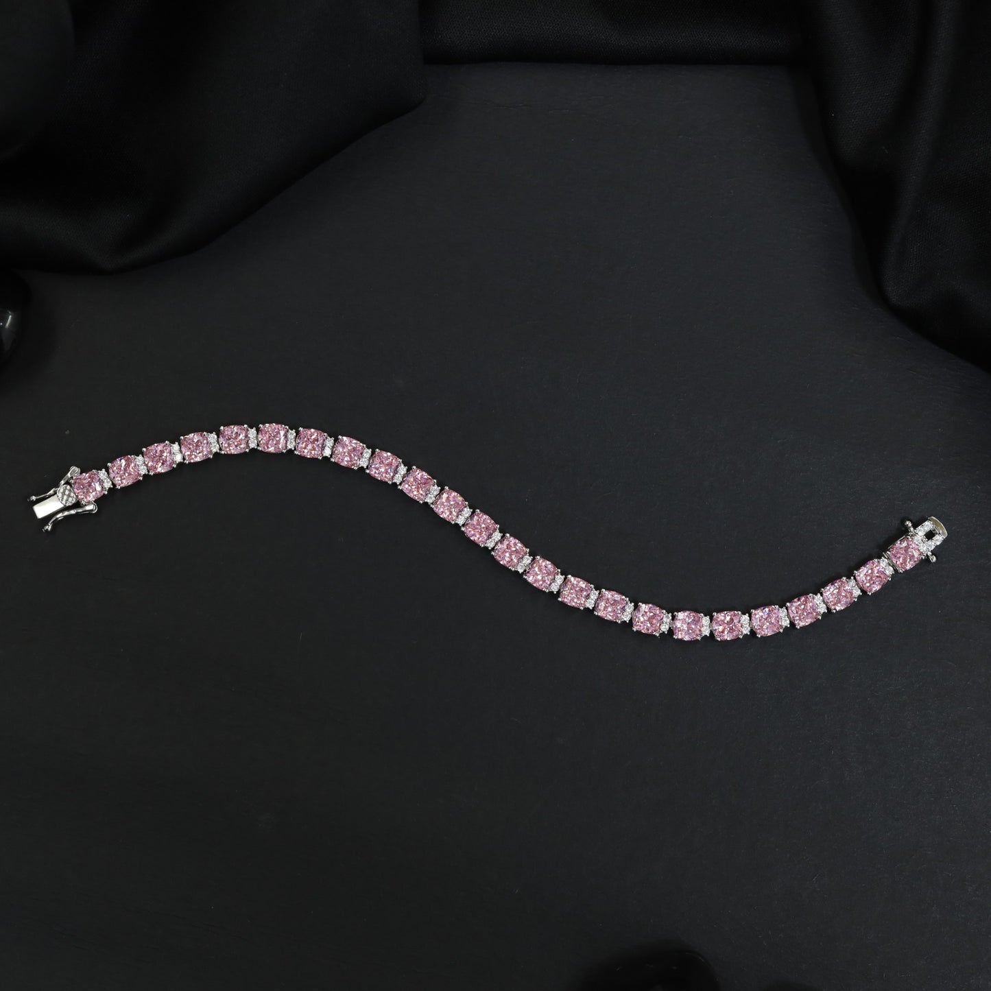 Rhodium Link Bracelet Showcasing Cushion Elements and Cluster Accents
