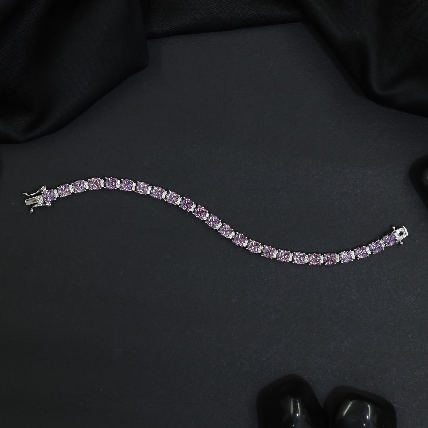 Rhodium Link Bracelet Showcasing Cushion Elements and Cluster Accents