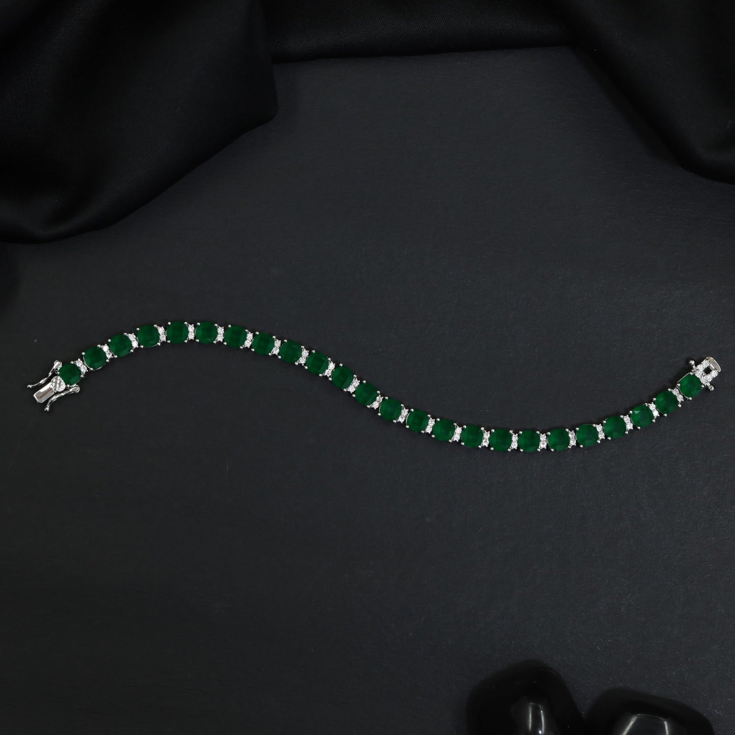 Rhodium Link Bracelet Showcasing Cushion Elements and Cluster Accents
