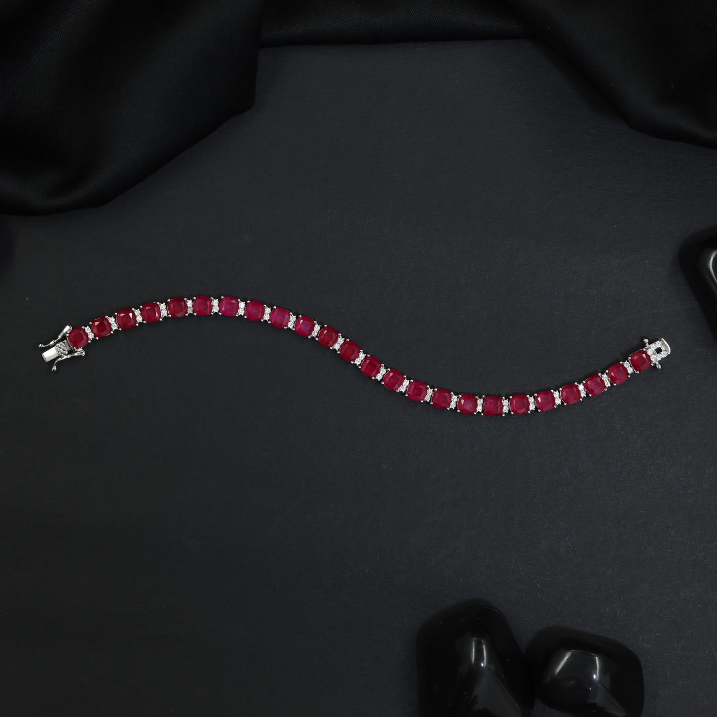 Rhodium Link Bracelet Showcasing Cushion Elements and Cluster Accents