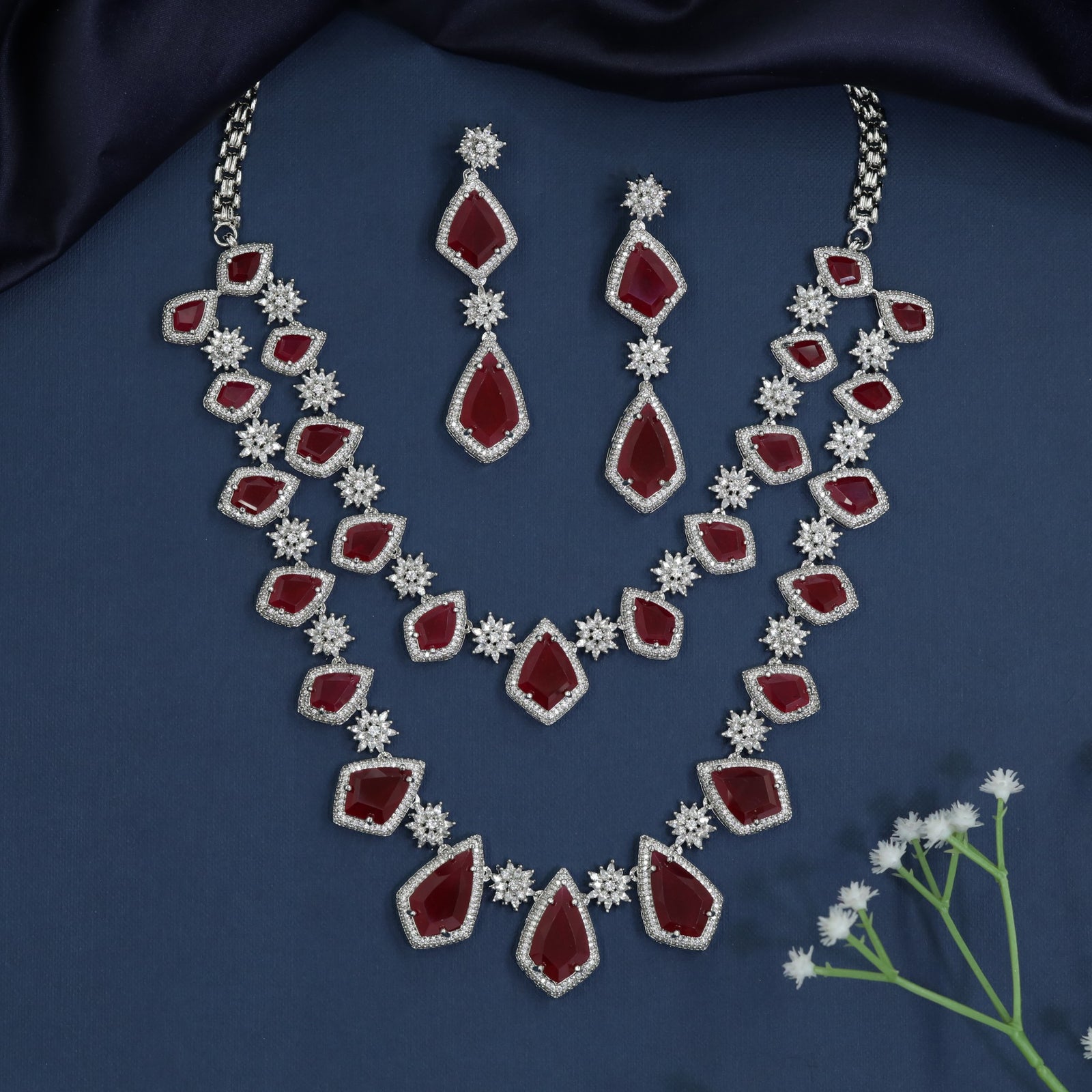 Premium rhodium necklace featuring gemstoneâ€‘studded framework