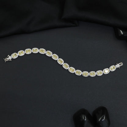 Distinctive rhodium bracelet featuring ornamental oval accents