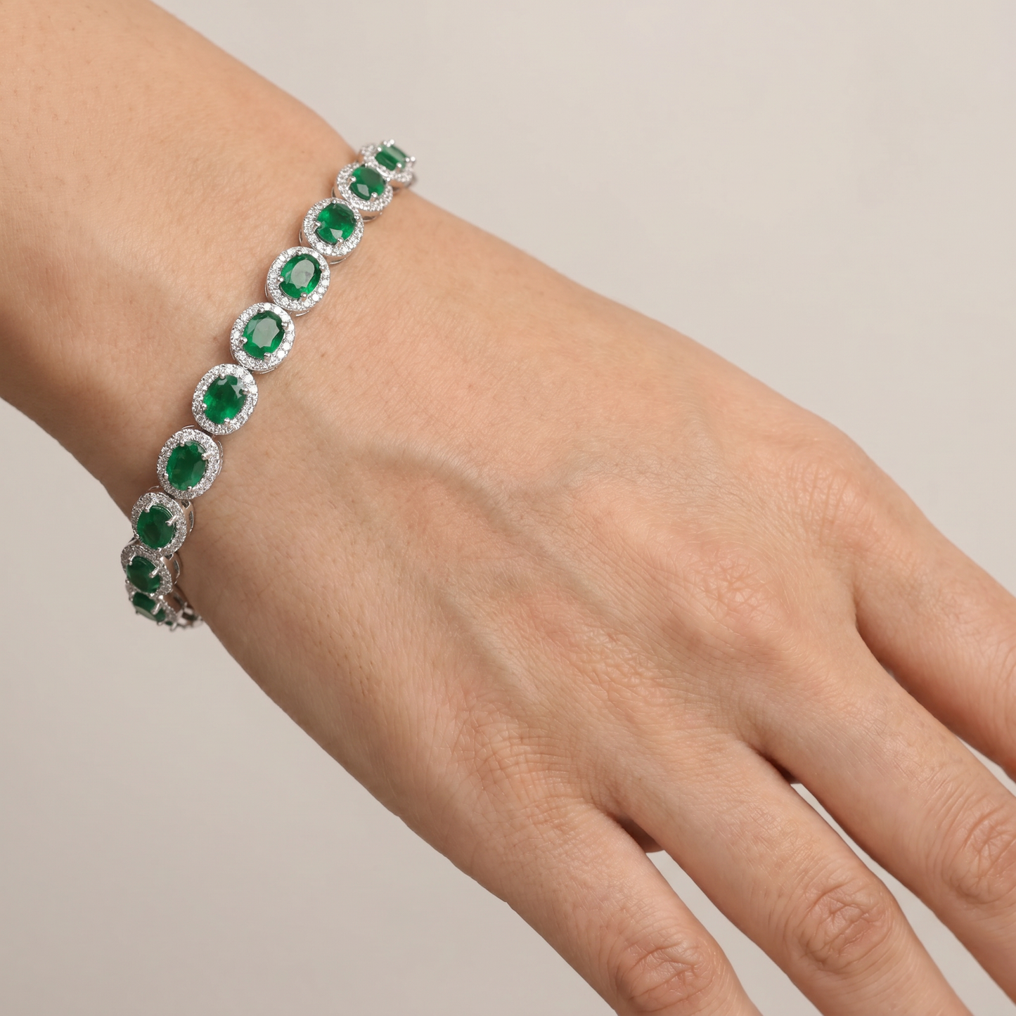 Distinctive rhodium bracelet featuring ornamental oval accents
