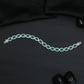 Distinctive rhodium bracelet featuring ornamental oval accents