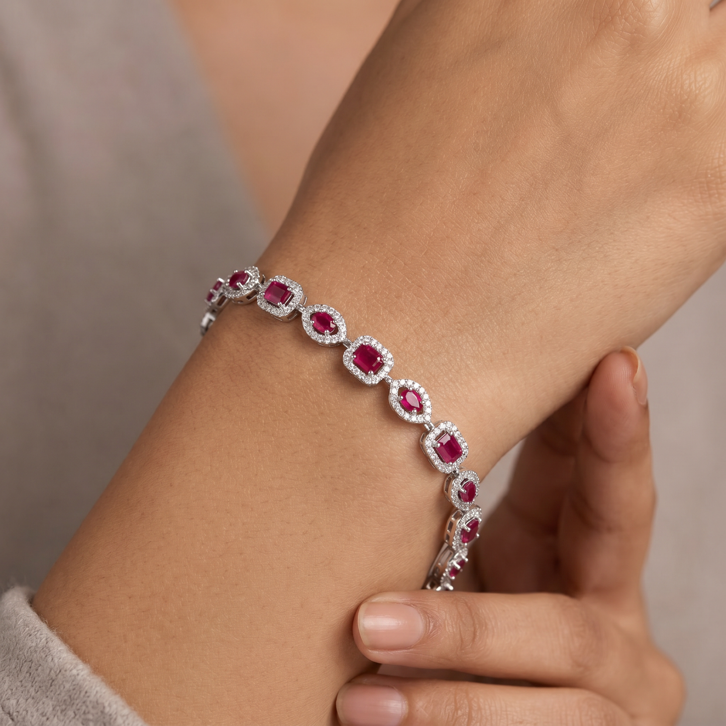 Refined rhodium bracelet with radiant bordered panels