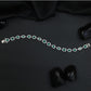 Refined rhodium bracelet with radiant bordered panels