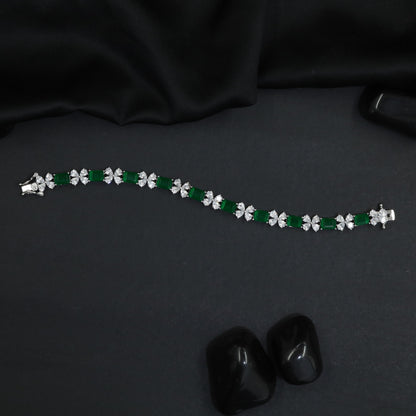 Radiant rhodium bracelet with ribbon‑style silhouettes