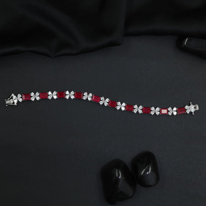 Radiant rhodium bracelet with ribbonâ€‘style silhouettes