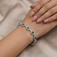 Artisan rhodium bracelet showcasing alternating square links