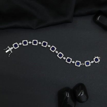 Artisan rhodium bracelet showcasing alternating square links