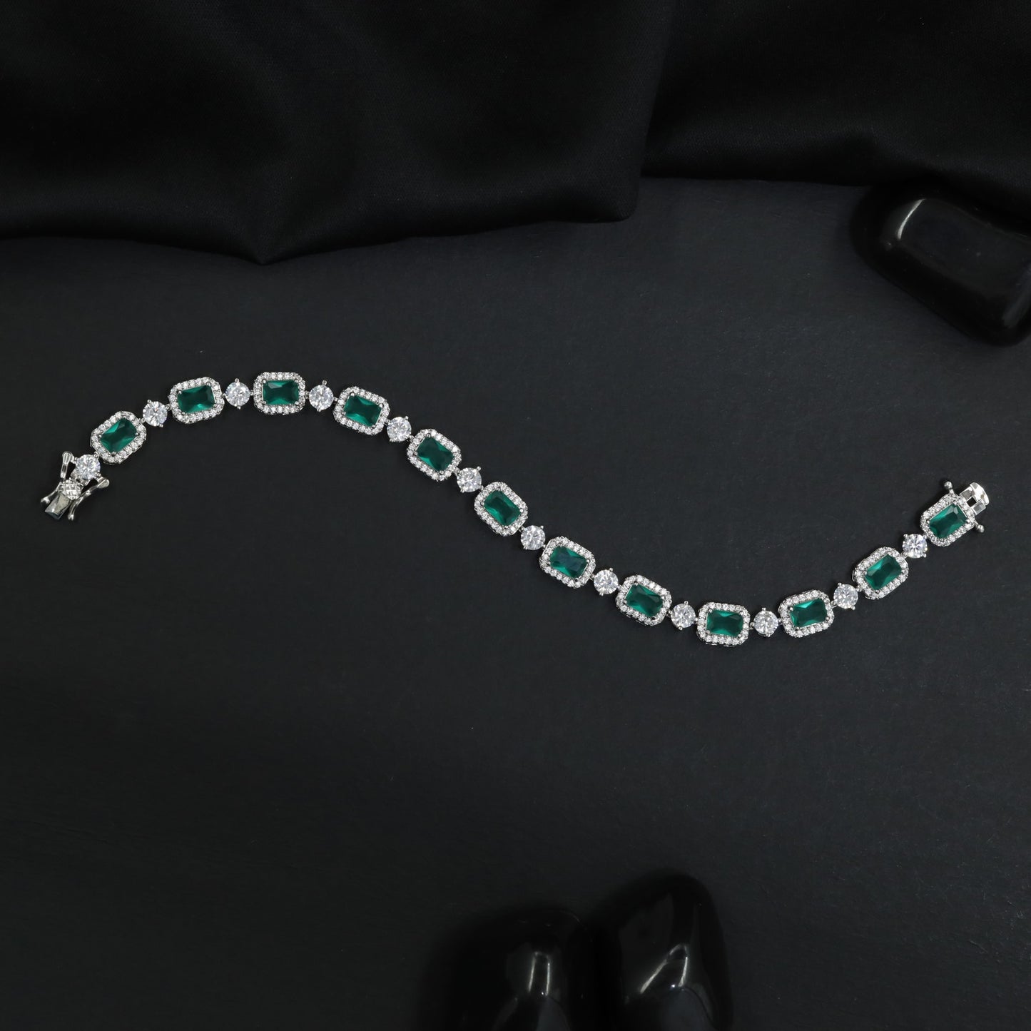 Contemporary rhodium bracelet featuring geometric link artistry