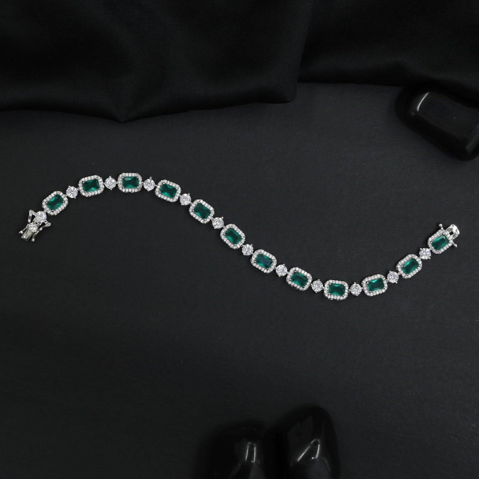 Contemporary rhodium bracelet featuring geometric link artistry