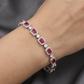 Contemporary rhodium bracelet featuring geometric link artistry