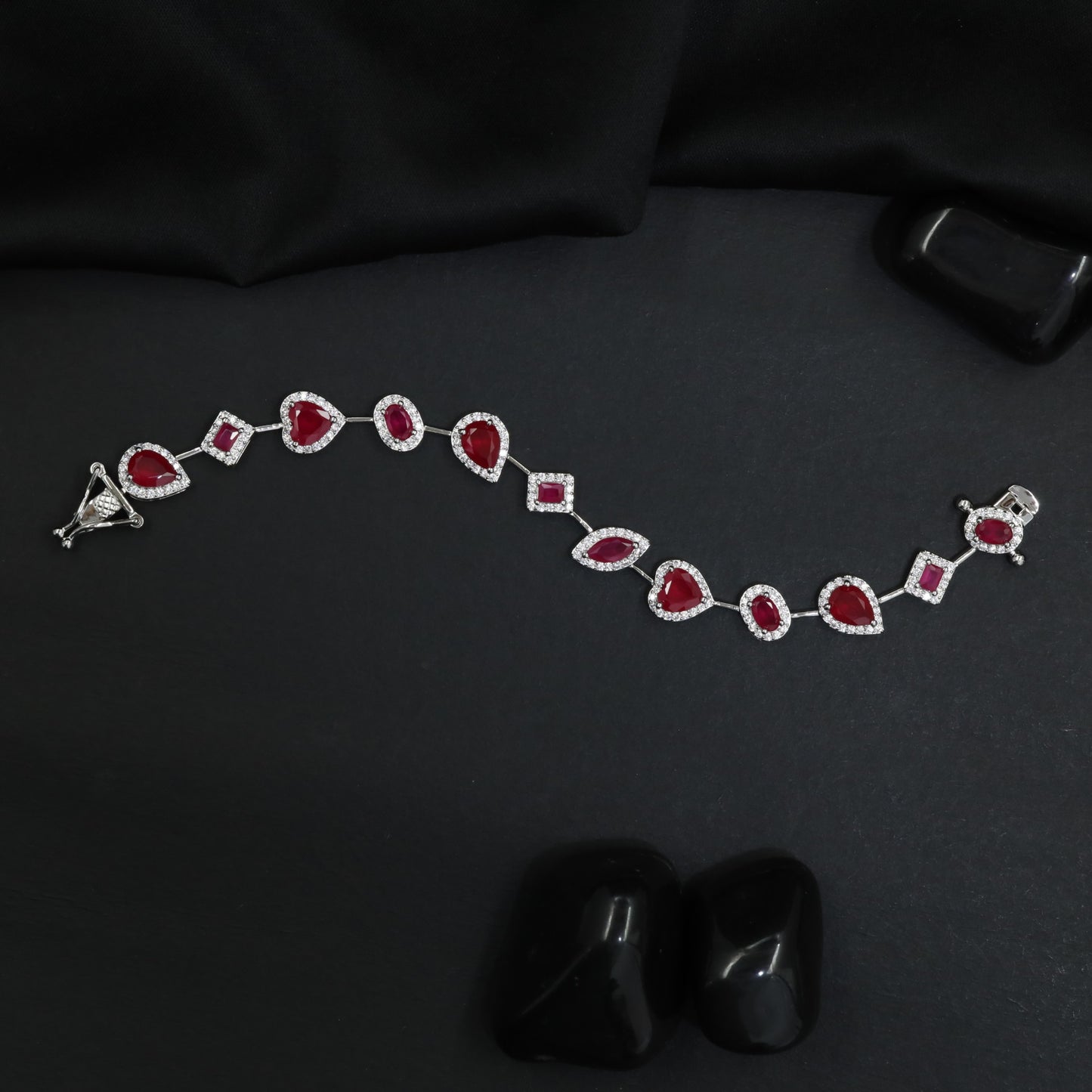 Luxe rhodium bracelet with alternating heart and oval motifs
