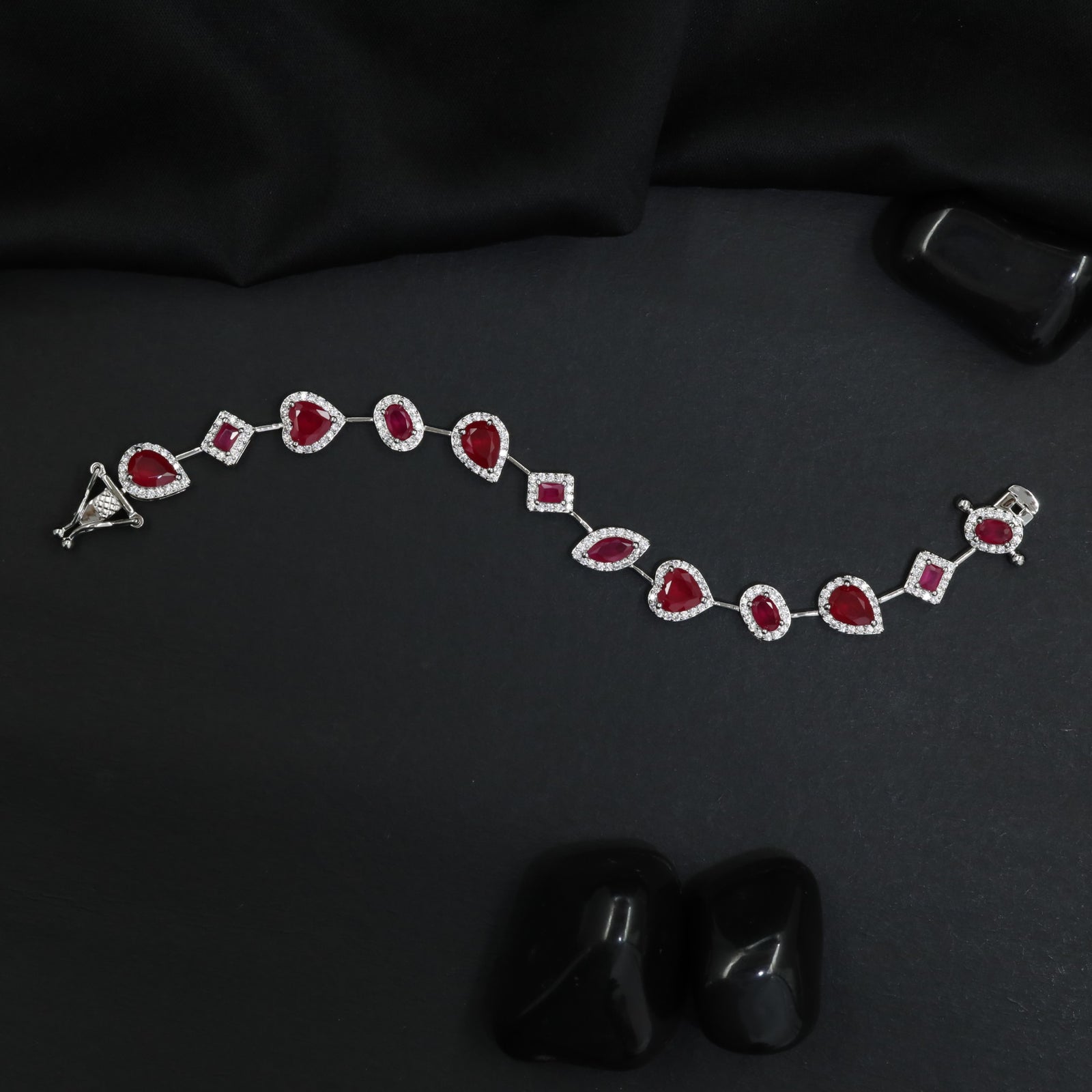 Luxe rhodium bracelet with alternating heart and oval motifs