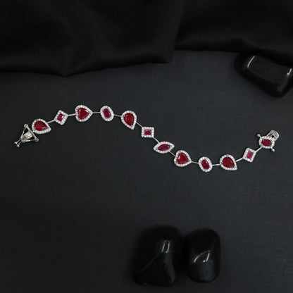 Luxe rhodium bracelet with alternating heart and oval motifs
