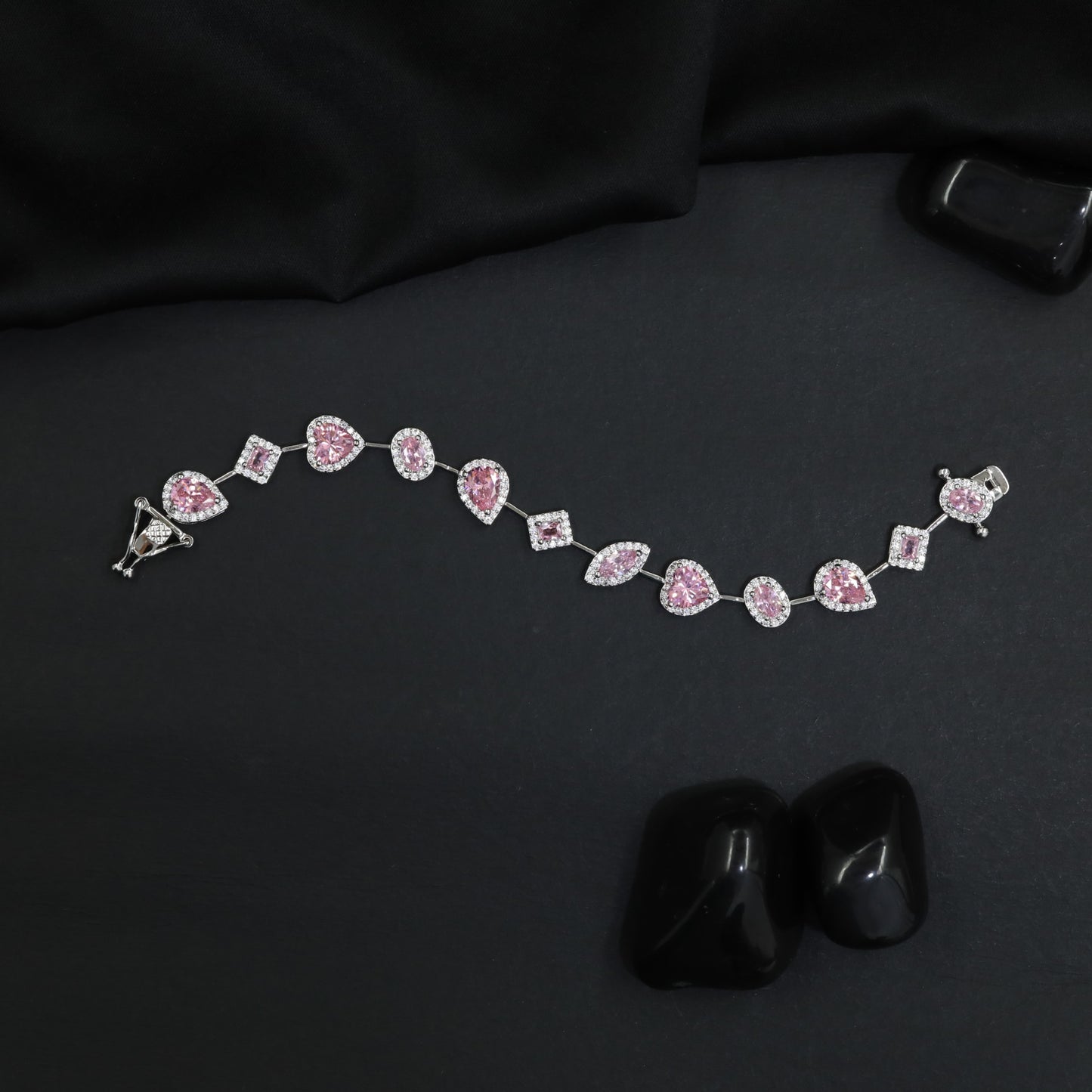 Luxe rhodium bracelet with alternating heart and oval motifs