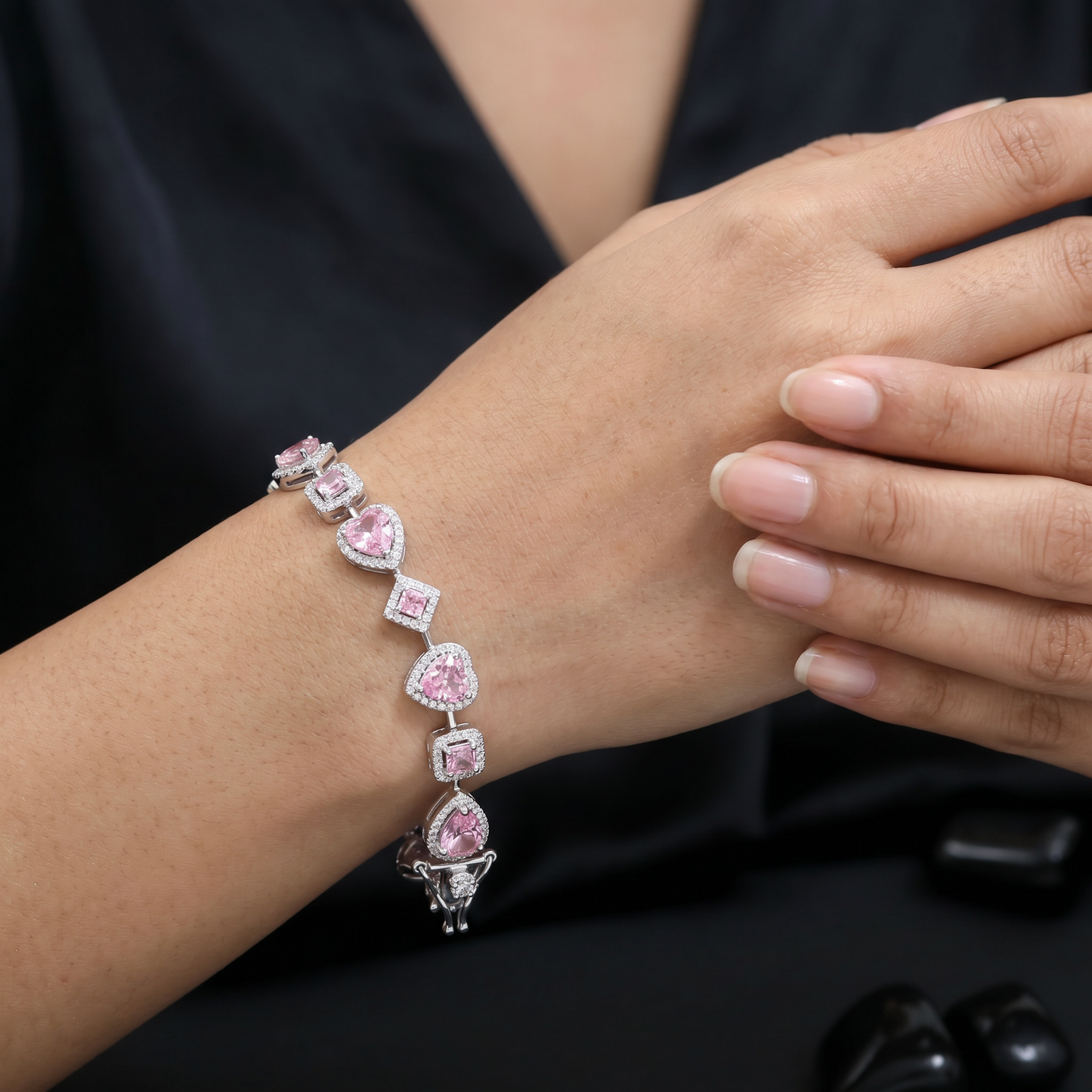 Luxe rhodium bracelet with alternating heart and oval motifs