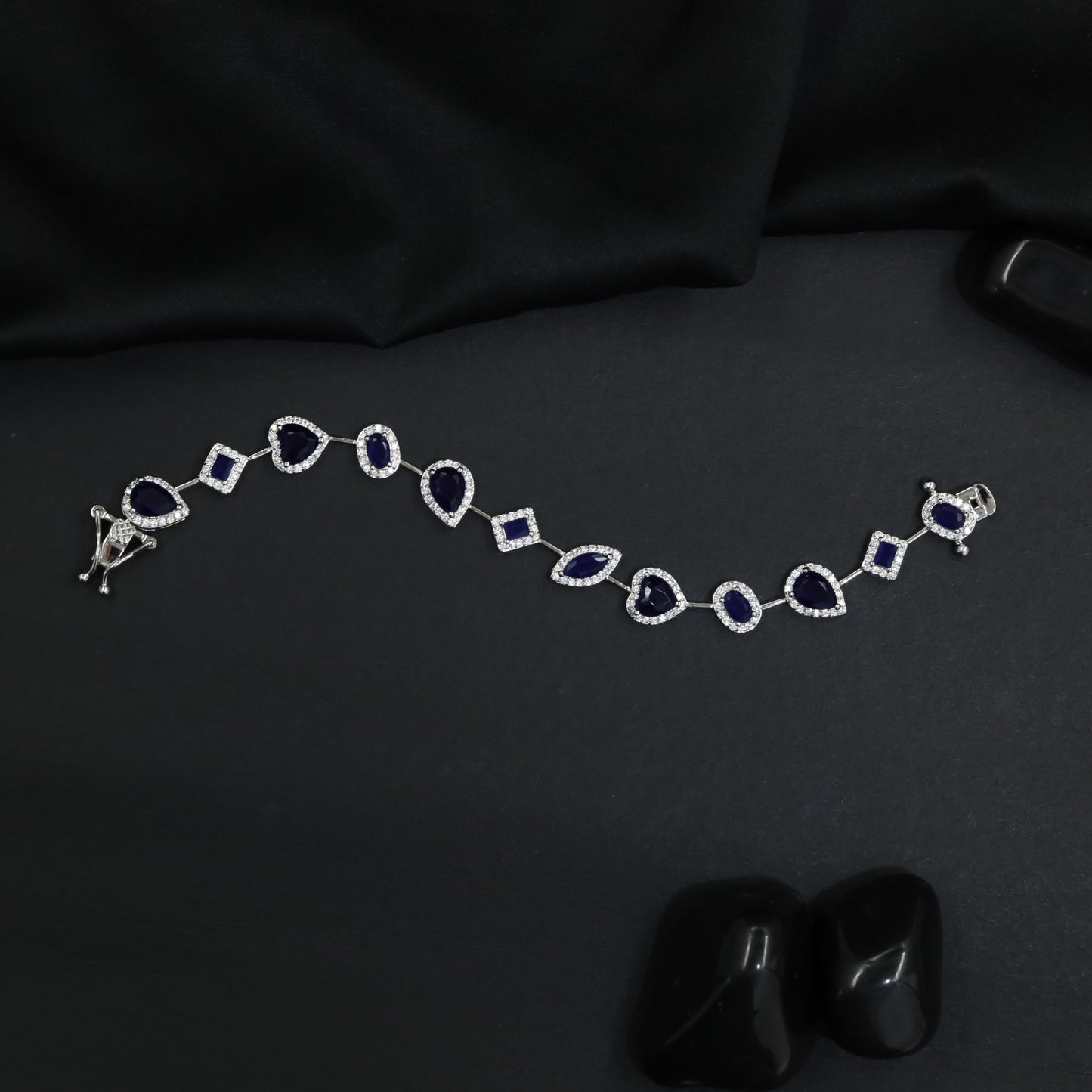Luxe rhodium bracelet with alternating heart and oval motifs