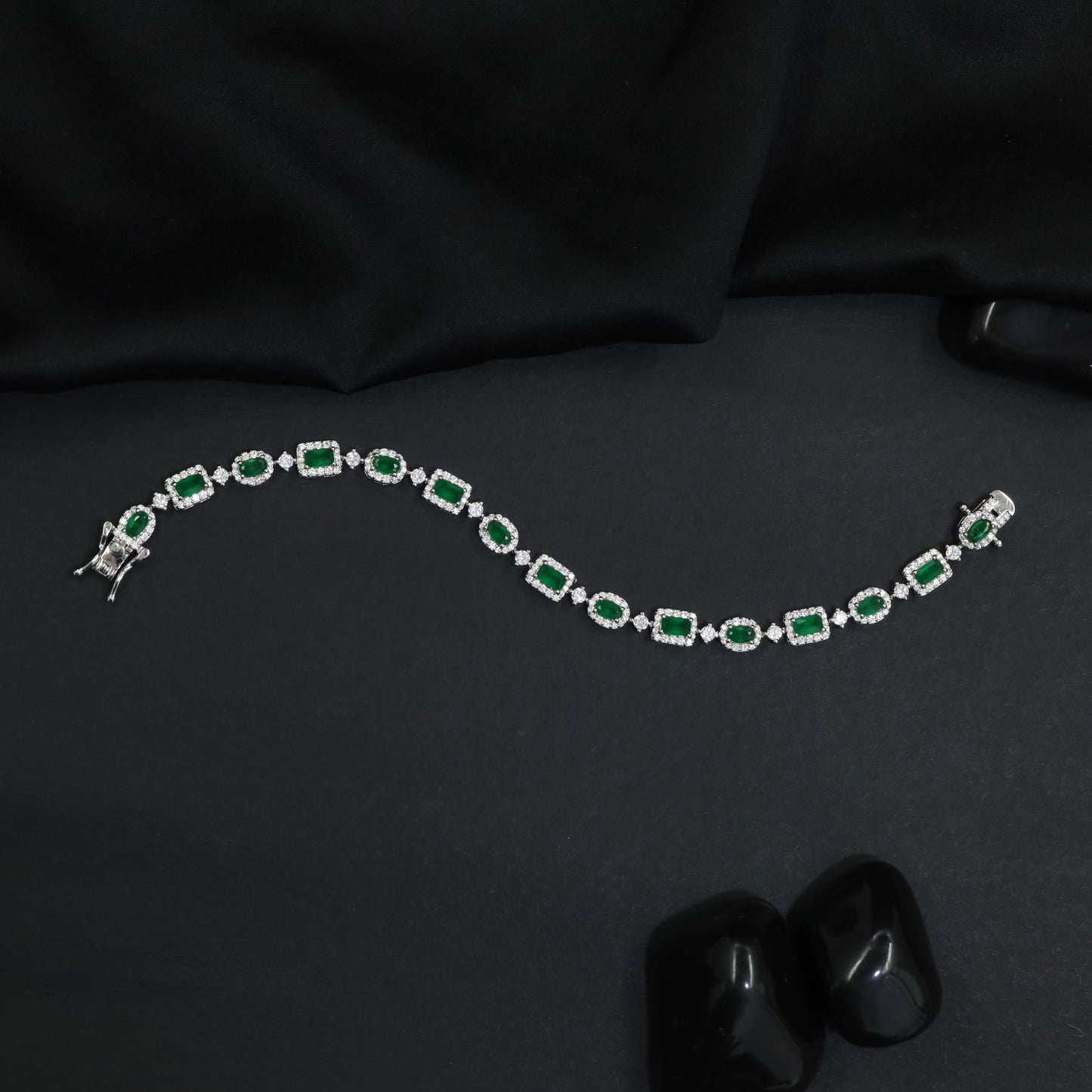 Glam rhodium bracelet with ornamental oval and rectangular artistry