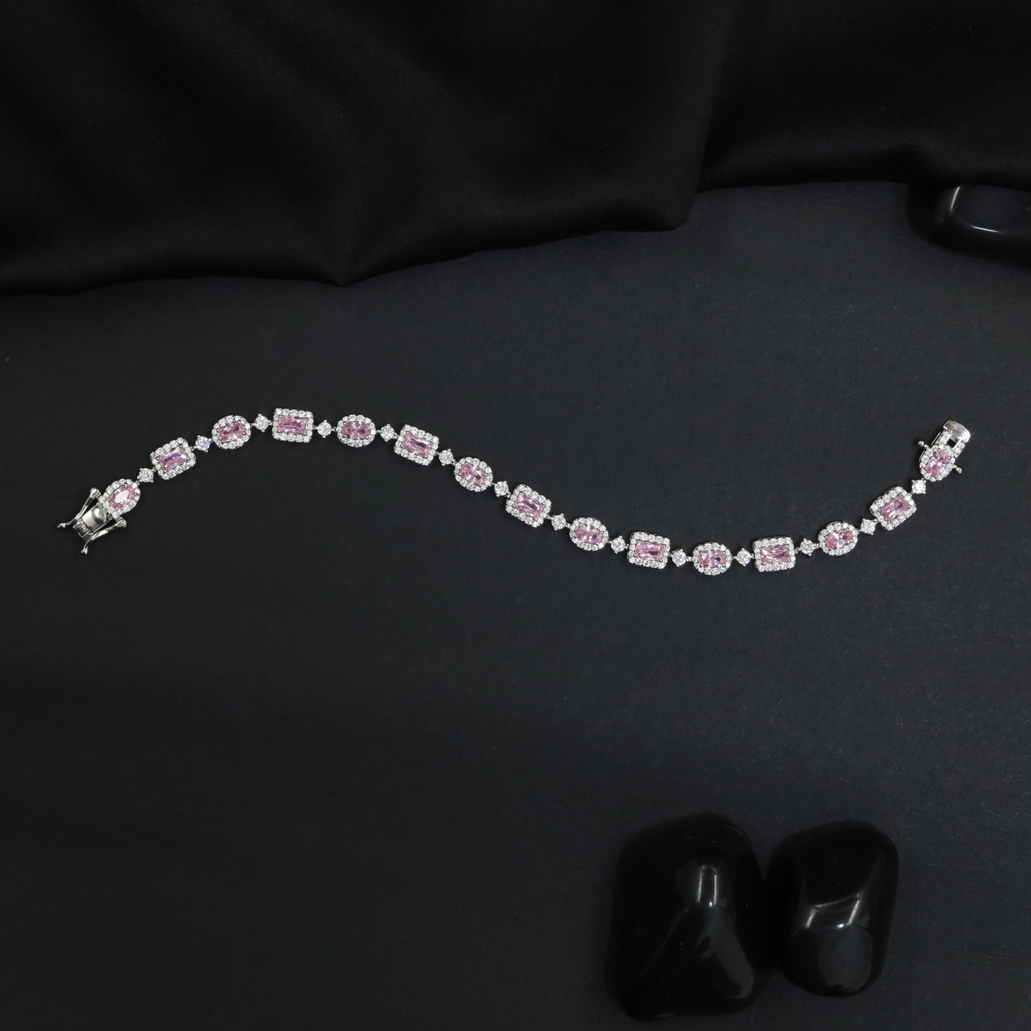 Glam rhodium bracelet with ornamental oval and rectangular artistry