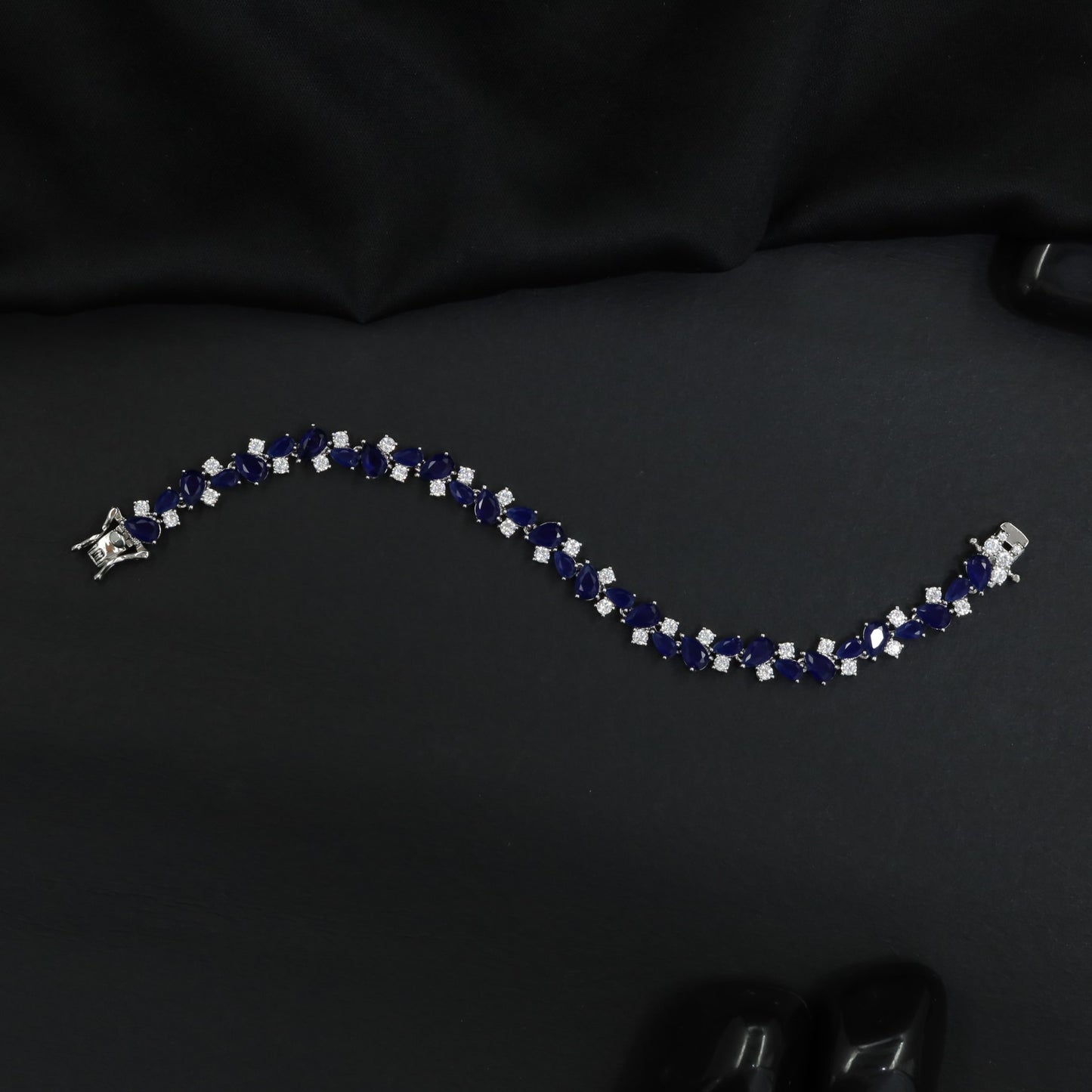 Luxe rhodium bracelet with alternating wave link artistry