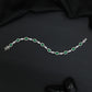 Rhodium Bracelet with Repeating Circular Elements and Decorative Leaf Links