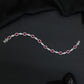 Rhodium Bracelet with Repeating Circular Elements and Decorative Leaf Links