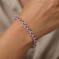 Rhodium Bracelet Featuring Alternating Leaf Elements and Round Links