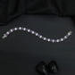 Rhodium Bracelet with Linear Geometric Arrangement and Decorative Connectors
