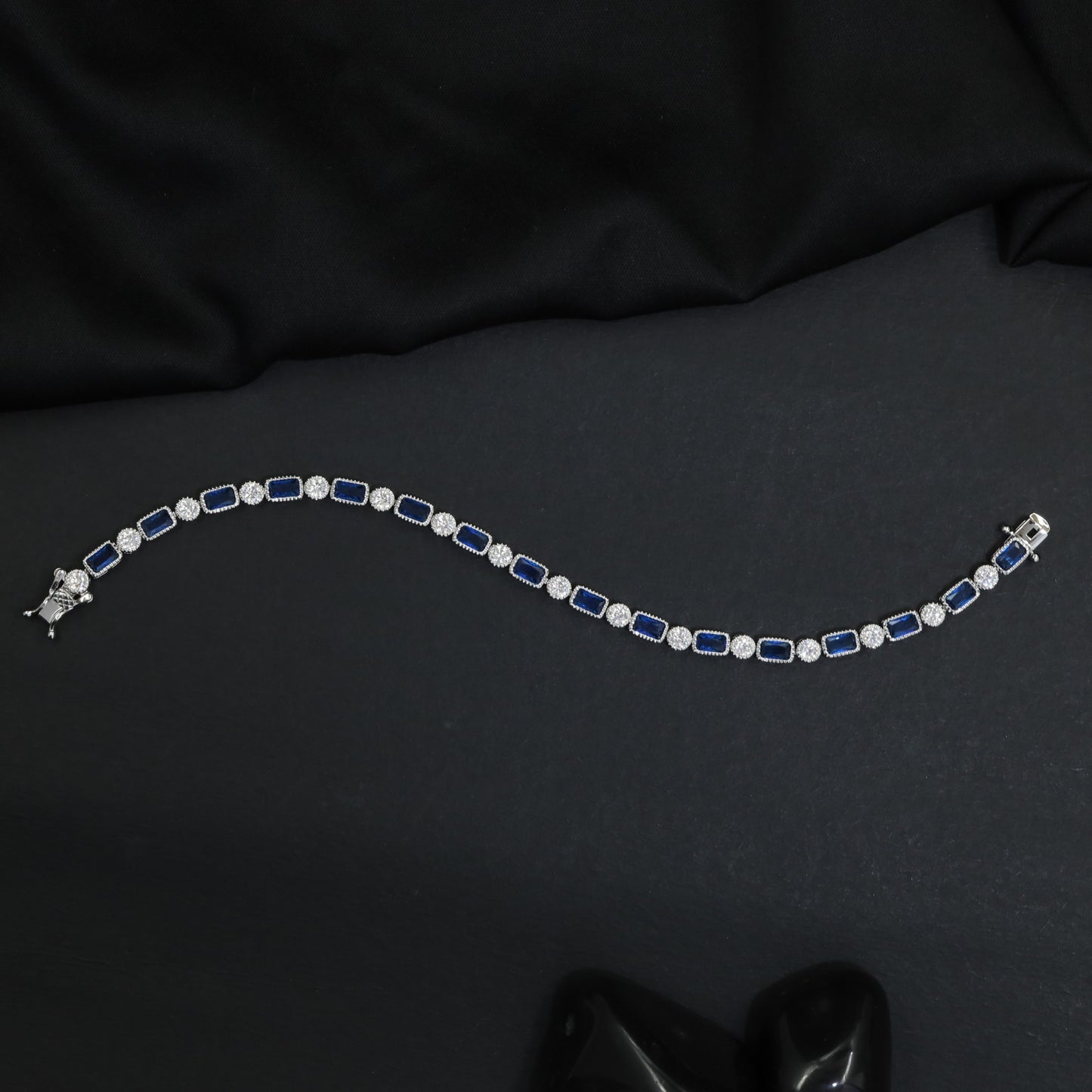 Rhodium Bracelet Featuring Framed Rectangular Links and Circular Elements