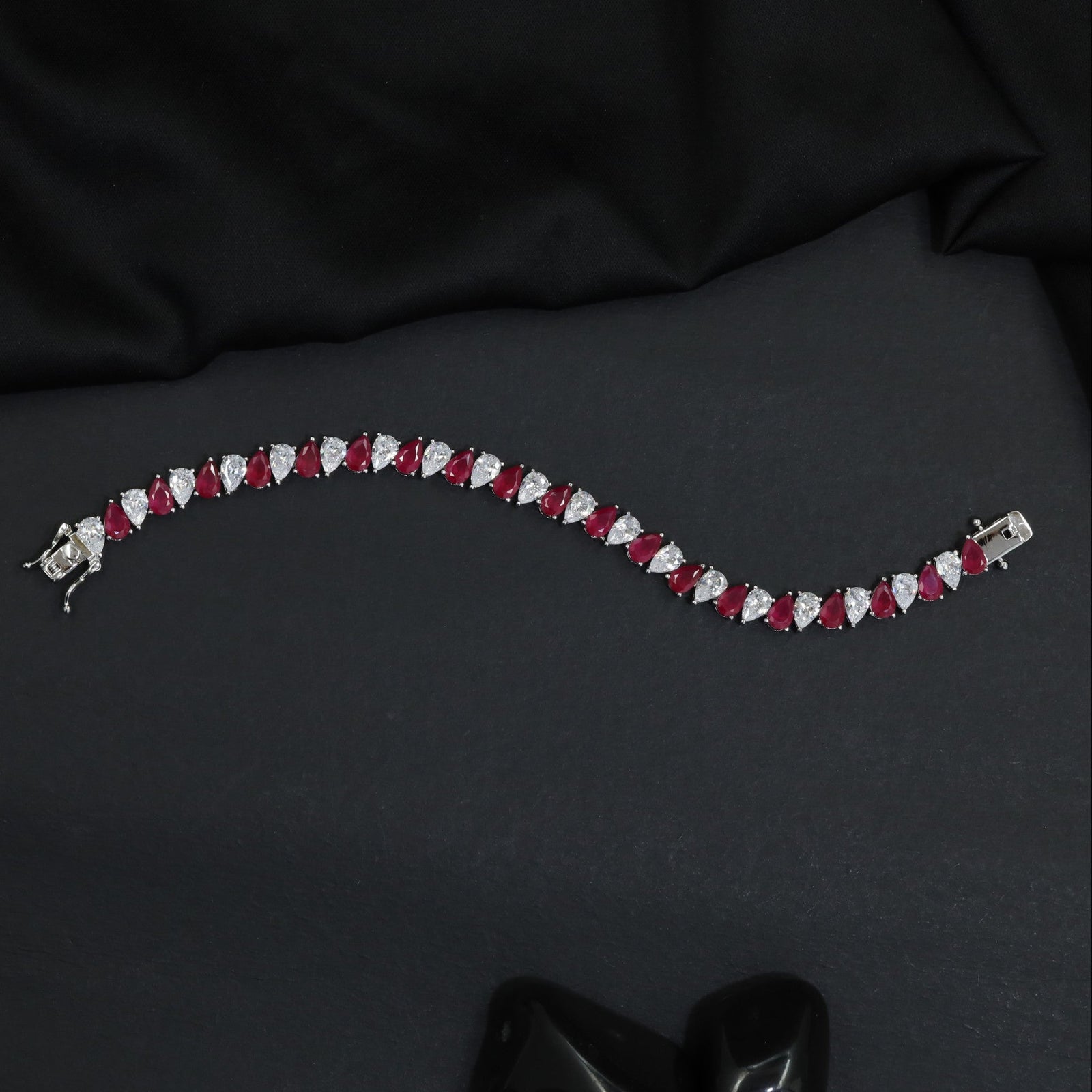 Contemporary Rhodium Bracelet with Repeating Leaf Arrangement