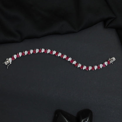 Contemporary Rhodium Bracelet with Repeating Leaf Arrangement