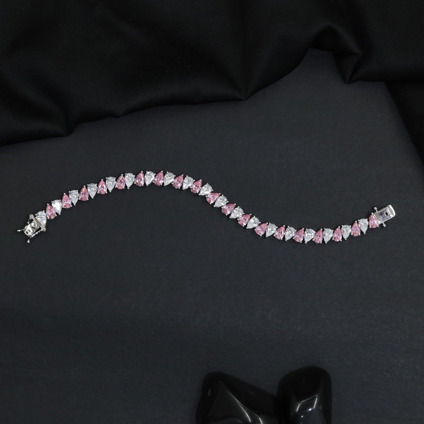 Contemporary Rhodium Bracelet with Repeating Leaf Arrangement
