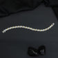 Contemporary Rhodium Bracelet with Repeating Leaf Arrangement