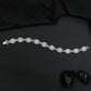 Rhodium Statement Bracelet Featuring Cushion Design and Linked Details