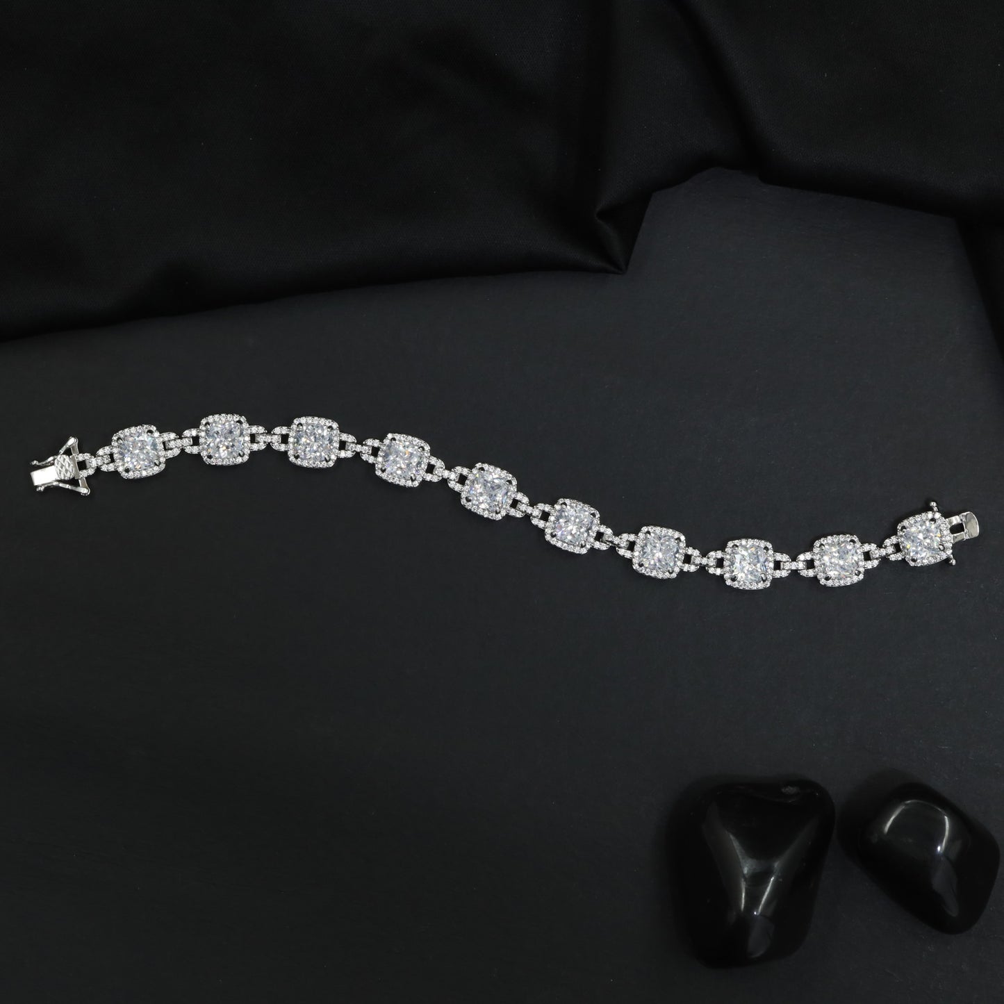Rhodium Statement Bracelet Featuring Cushion Design and Linked Details