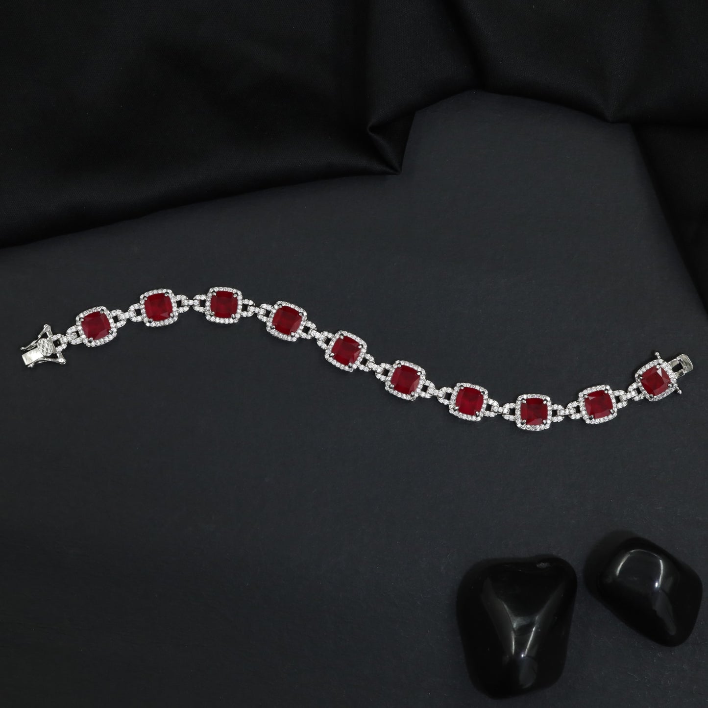 Rhodium Statement Bracelet Featuring Cushion Design and Linked Details
