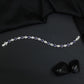 Rhodium Bracelet Featuring Alternating Navette and Leaf Elements